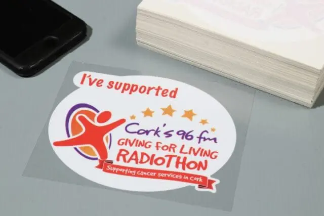 promotional window vinyl stickers printed on clear vinyl with a custom shaped white underpin under the design to ensure it stands out