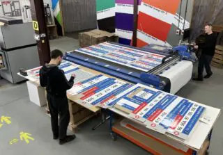 man printing custom marketing materials
