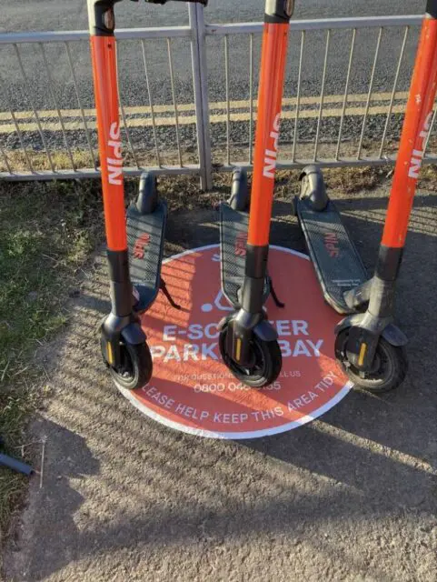 electric scooters on parking stickers