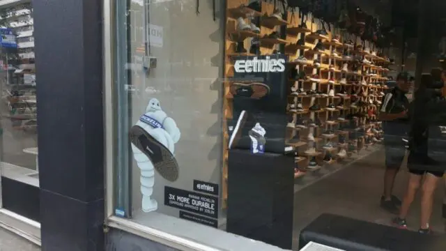 white window sticker of Michelin man - Custom printed window stickers for retail