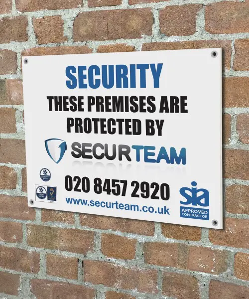 Security sign installed on a wall