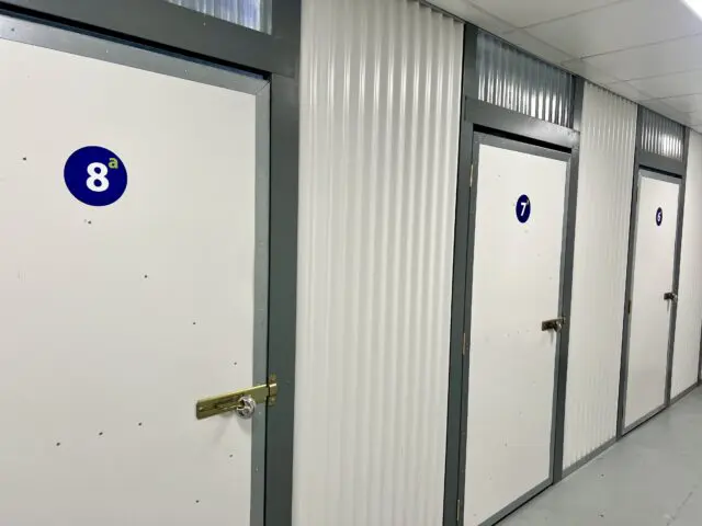 Custom printed self storage unit identification stickers with numbers and letters