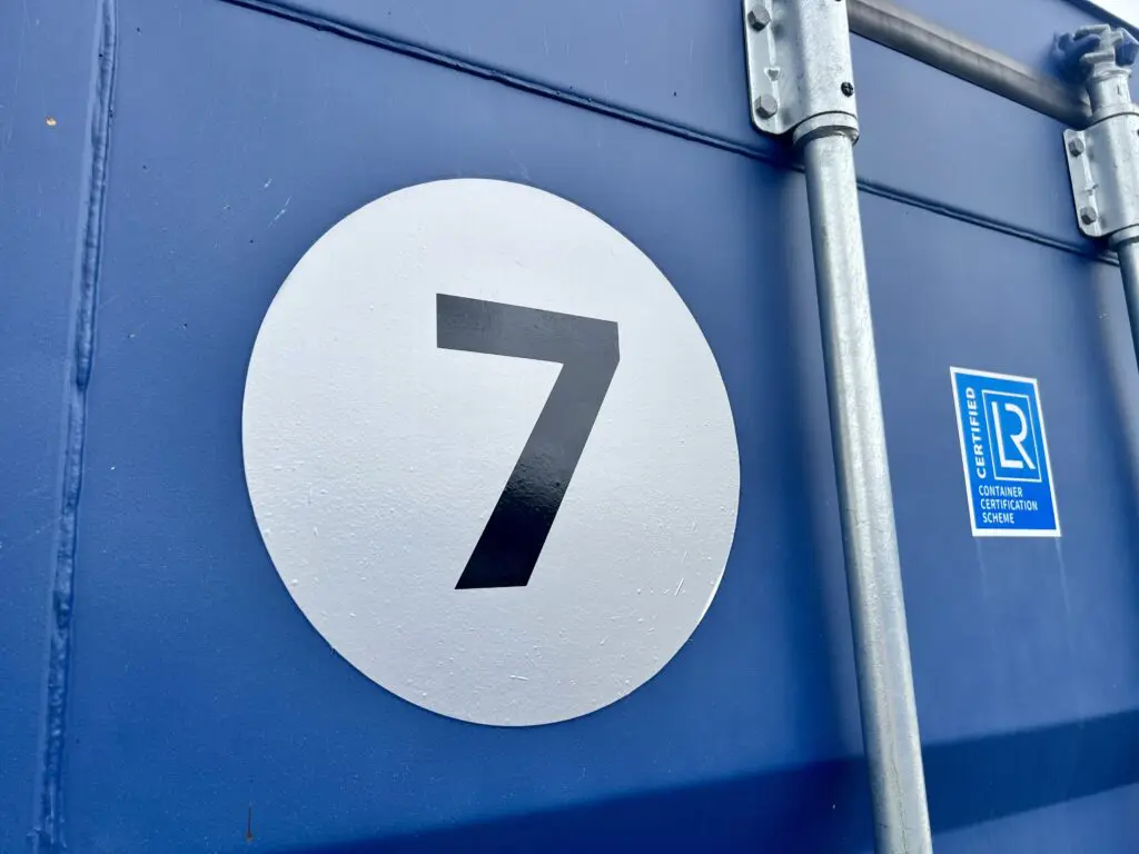 High tack vinyl number stickers for outdoor self storage containers and painted metal doors