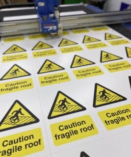 printed caution fragile roof hazard signs
