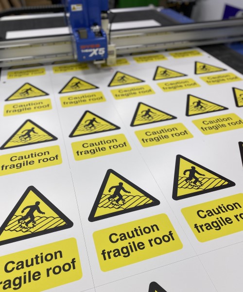 printed caution fragile roof hazard signs