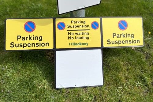 Are parking suspension signs easy to install?