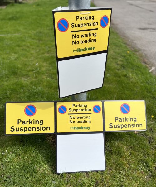 Wrap around parking suspension signs