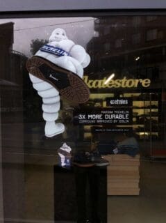 custom window stickers printed with michelin man - white ink on a transparent vinyl window sticker