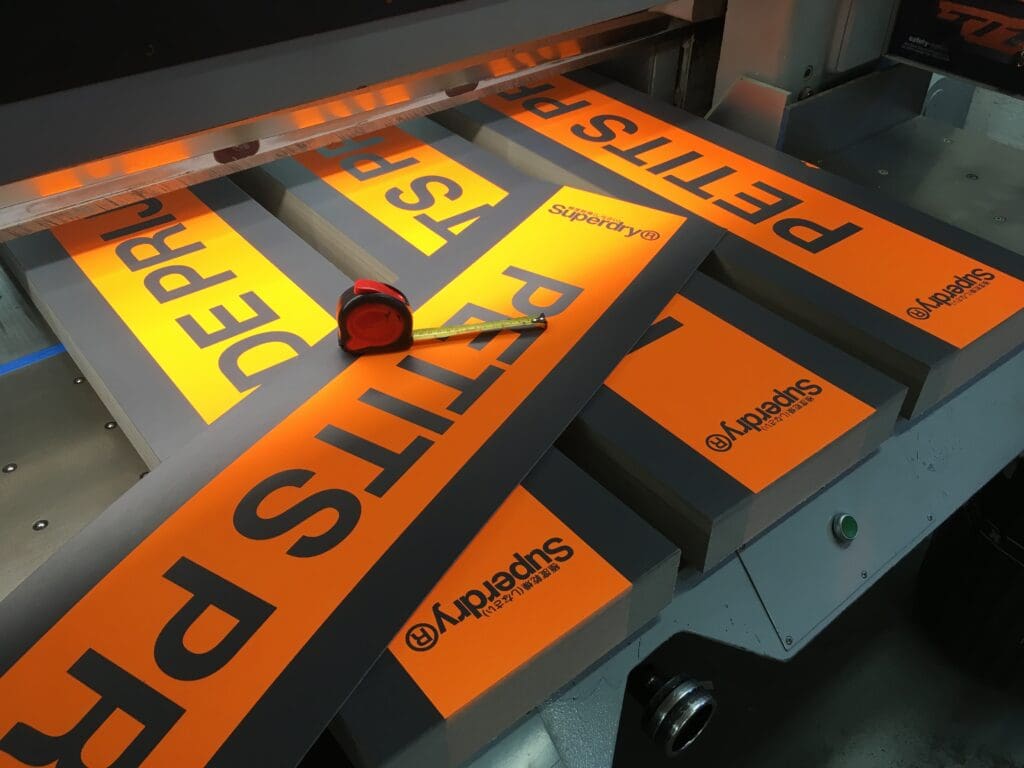 Day glo fluorescent printed retail signs