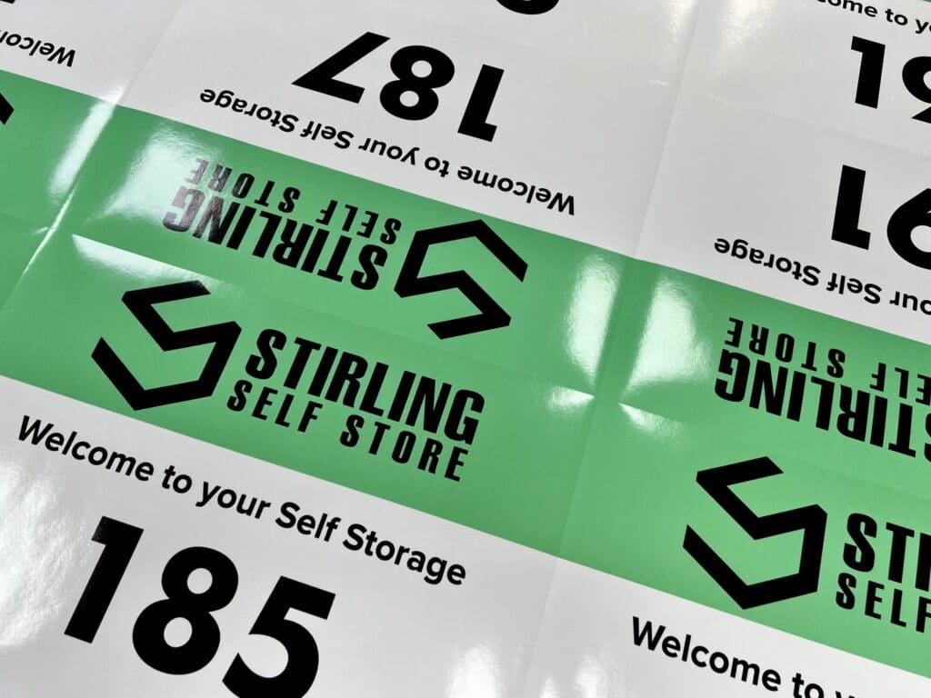Branded self storage stickers for unit doors