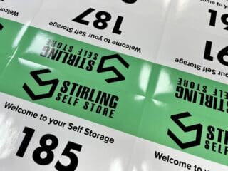 Branded self storage stickers for unit doors