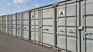 Shipping containers with unit number stickers