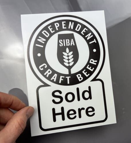 Window sticker reverse printed on to transparent vinyl with a flooded backing white creating a solid colour