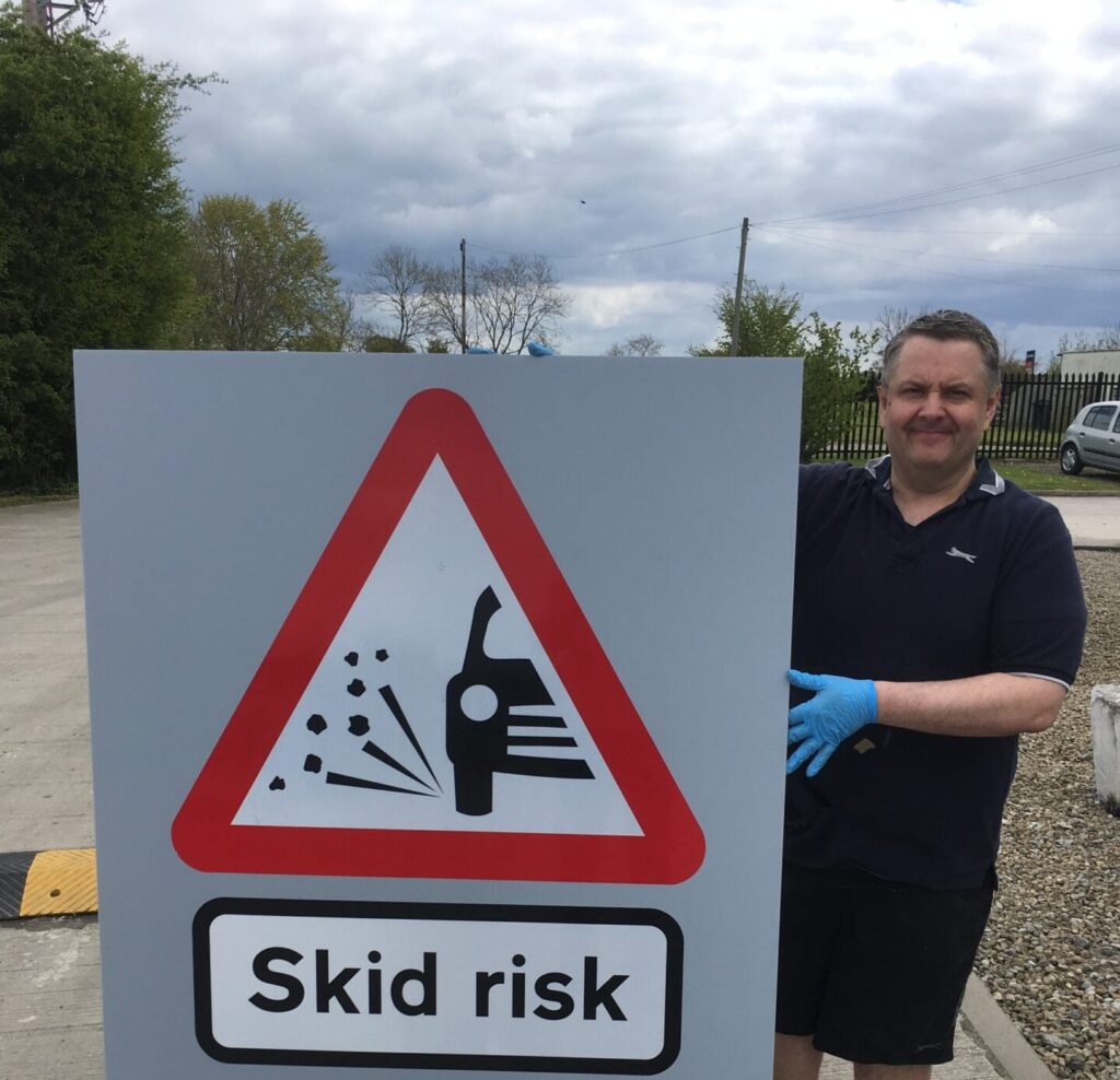 surface dressing signs skid risk loose chipping max speed 20mph