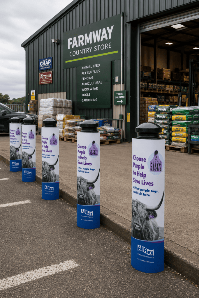 custom printed branded boallard covers used outside a warehouse country store