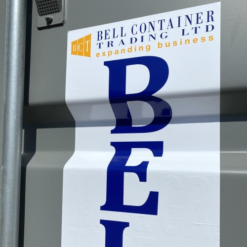 Branded self storage container stickers with company logo on outdoor shipping container